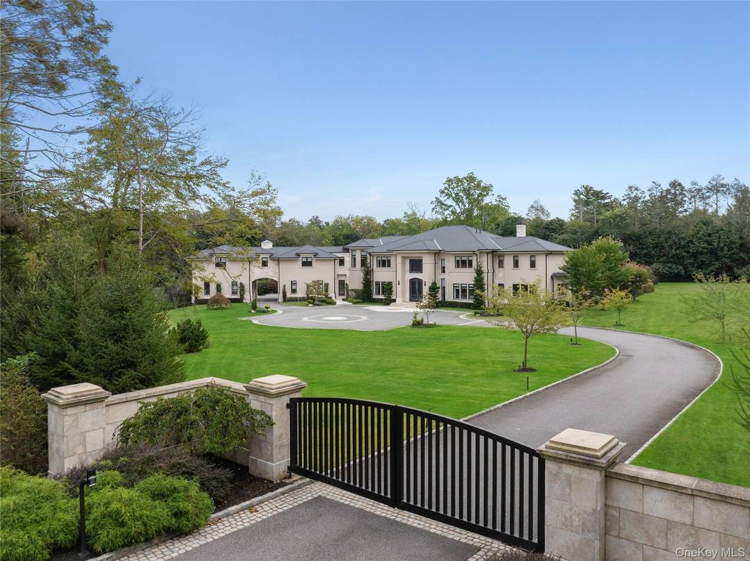 Situated behind two private gates, in one of Long Island s most prestigious enclaves, this newly constructed 10 bedroom, 15 bathroom modern estate is a masterclass in elevated design and ...