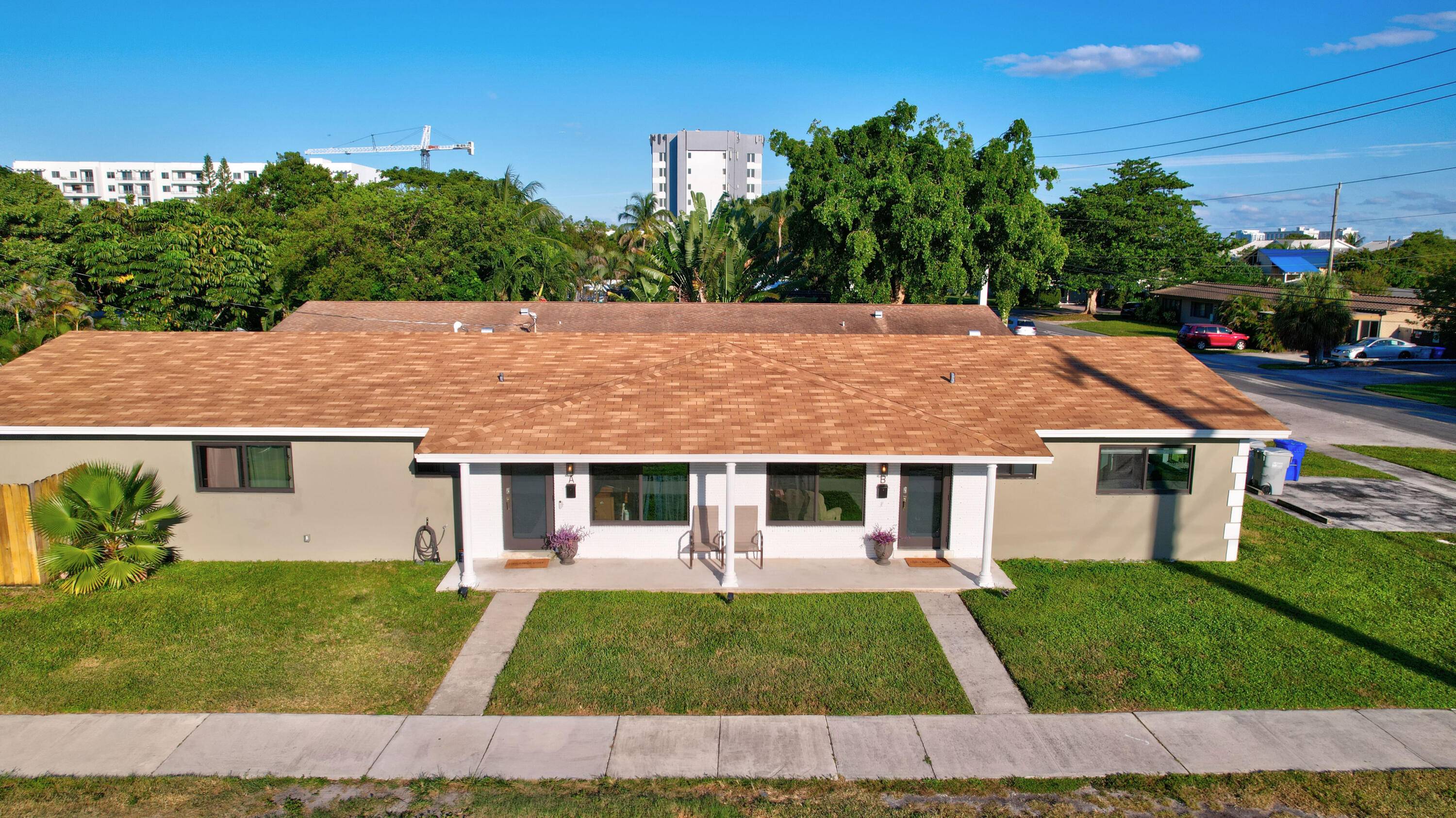 Beautifully updated duplex in Pompano Beach offers modern living with a private backyard oasis.
