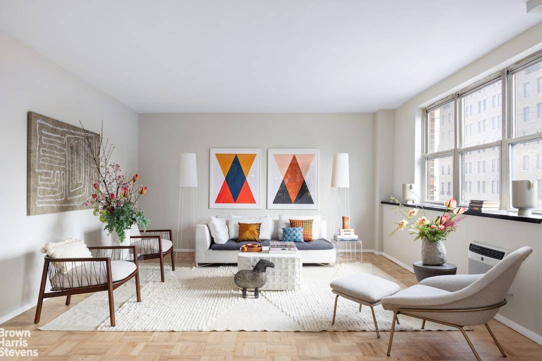 Apartment 16G is a generously proportioned one bedroom residence, offering both a full bathroom and a convenient powder room off the foyer.