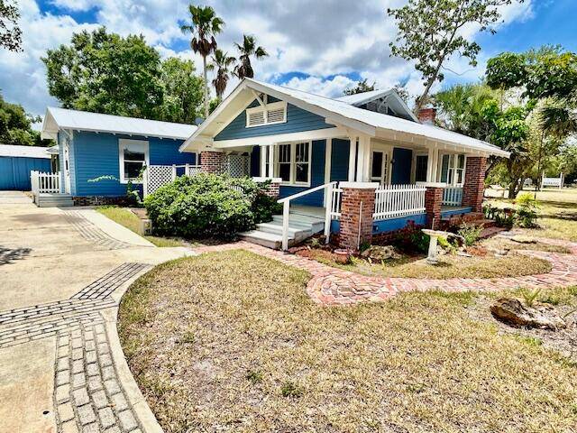 Completely renovated four bedroom two bath Victorian home with a wraparound porch, new kitchen cabinets, countertops, flooring, modern lights throughout the property 72 inch vanity with Full shower, body system.