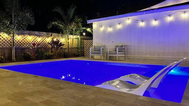 Super charming Key West style home with NEW POOL 2024 with impact windows 2022, new HVAC 2022, 2BR plus den office 3rd BR, updated kitchen including real wood cabinets with ...