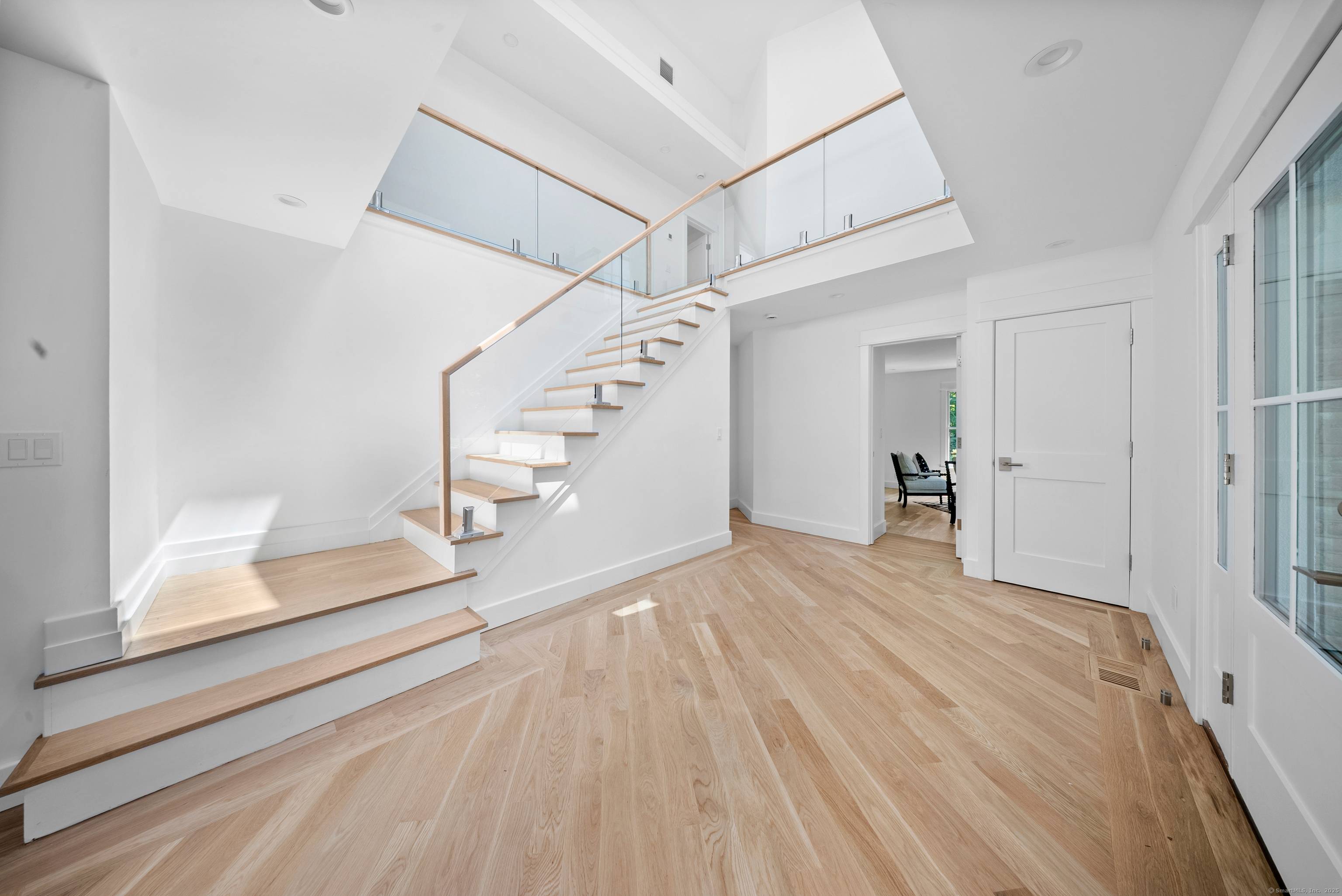 Set on a park like 3 acre level lot this exceptional home blends modern luxury with thoughtful design and quality craftsmanship throughout.