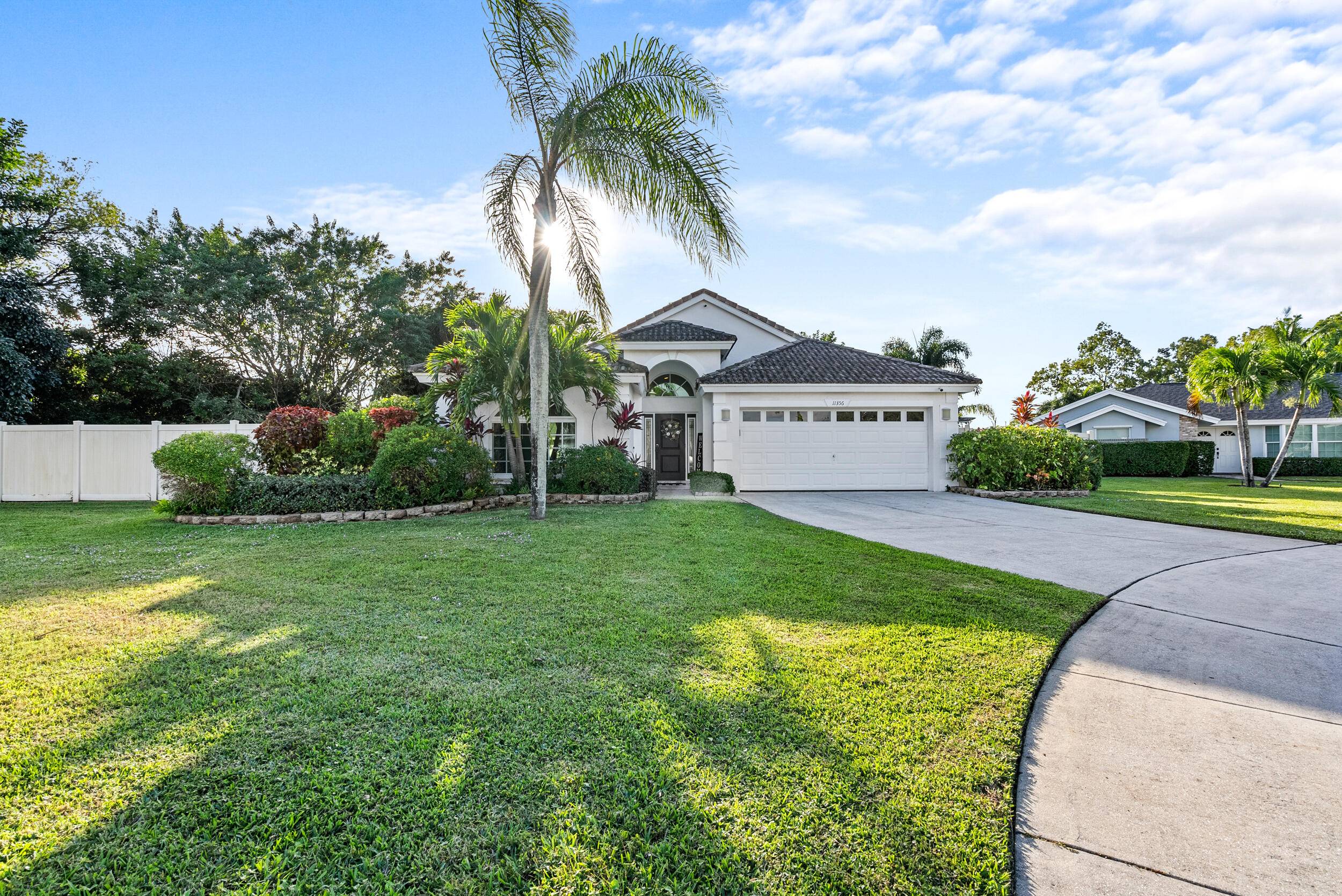 Nestled in the heart of Wellington with no HOA, this 4BR 2.