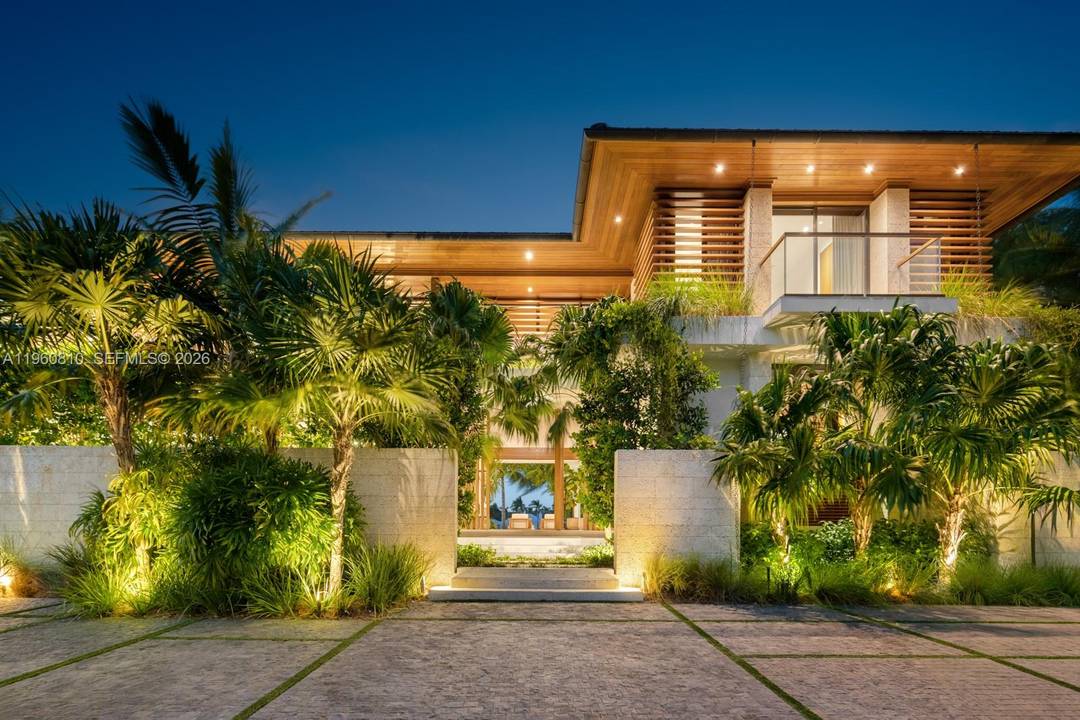 An architectural statement of modern waterfront elegance set within the private guard gated enclave of Old Cutler Bay, this exceptional custom built estate by renowned architect Cesar Molina showcases refined ...