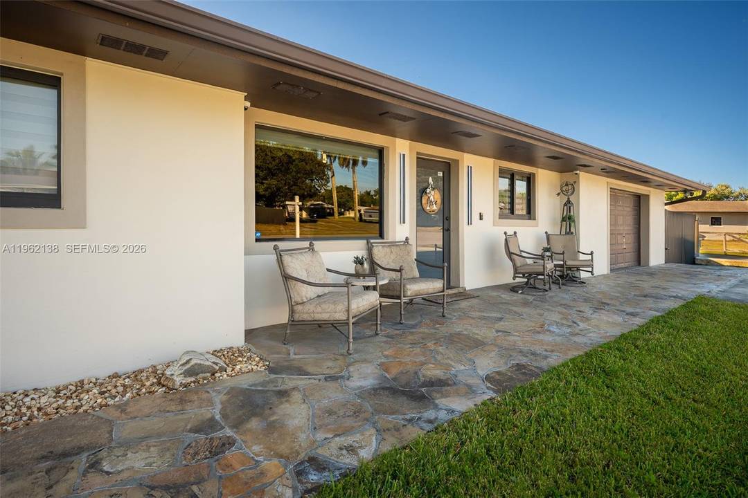 Welcome to a corner lot home that immediately feels cozy, welcoming, and thoughtfully cared for.