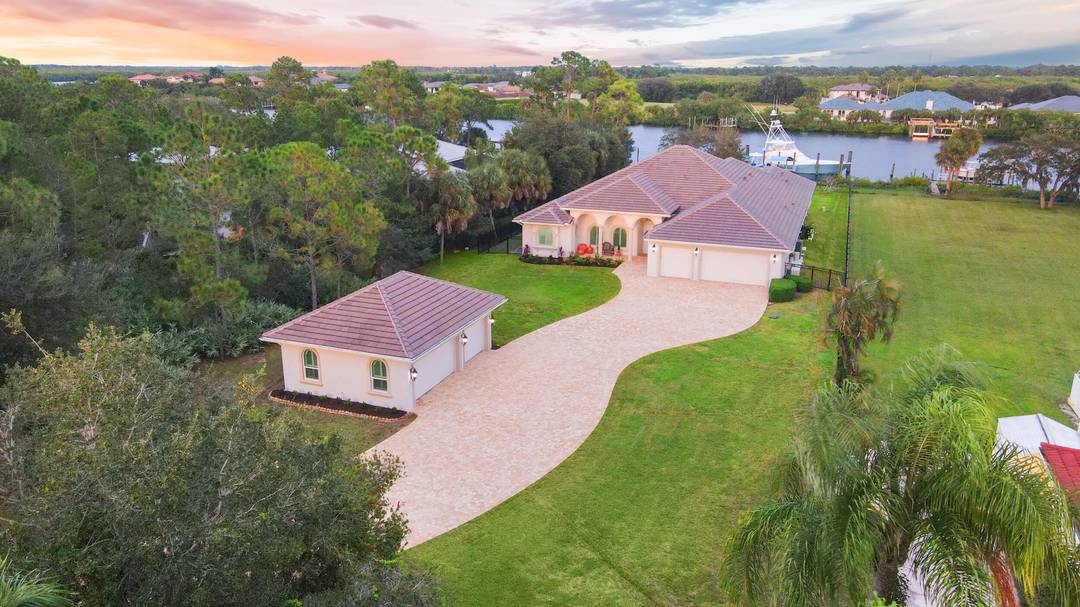 This architectural showpiece of coastal waterfront living delivers secure yacht ownership with a hurricane hole rated aprox 70' slip, deepwater ocean access, and over 1 acre in Vikings Lookout.