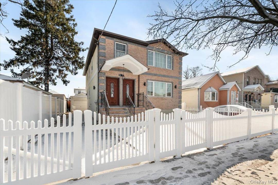 This 2 family residence combines modern finishes with practical design and functional living spaces.