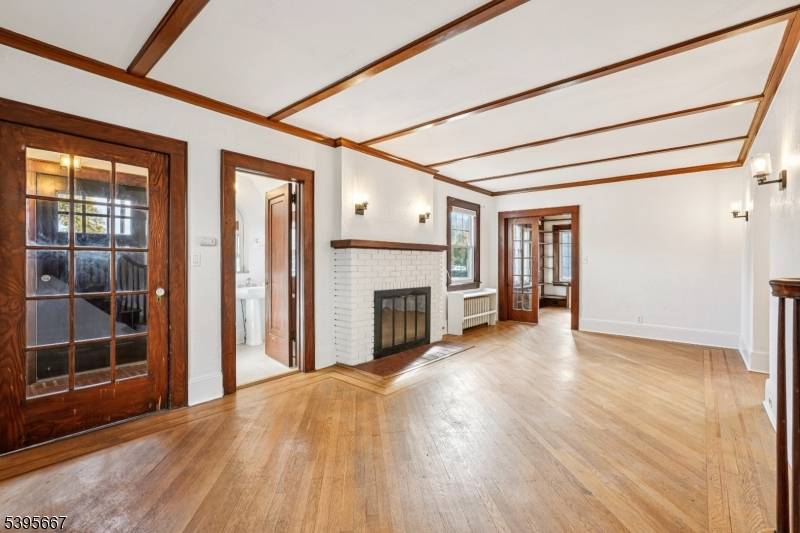 Nestled in the heart of Dover, this turn key Tudor style Colonial is situated in a welcoming neighborhood renowned for its local charm.