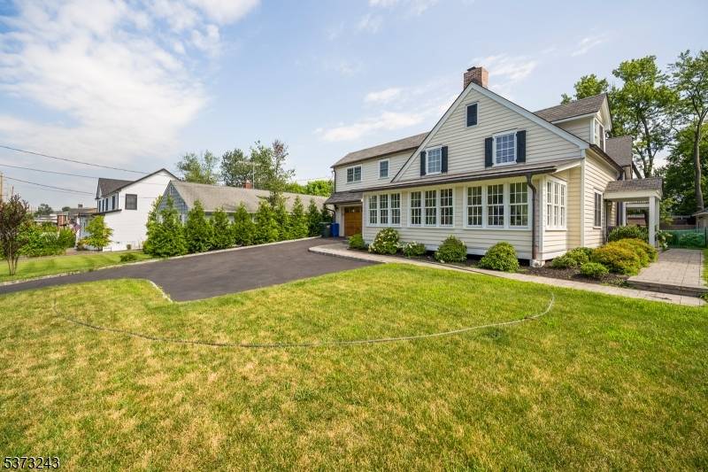 Step into a piece of Westfield history at 923 Central Ave, a stunning Colonial originally built in 1757 and thoughtfully renovated to blend timeless character with modern comfort.