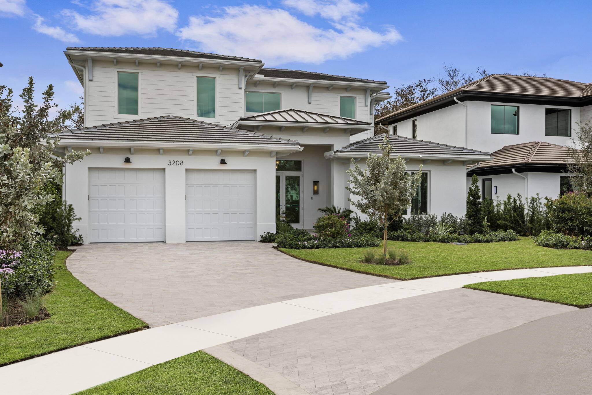 Nestled in the prestigious Blue Cypress community of Palm Beach Polo and Country Club, this stunning new construction home offers an unparalleled blend of luxury and modern design.