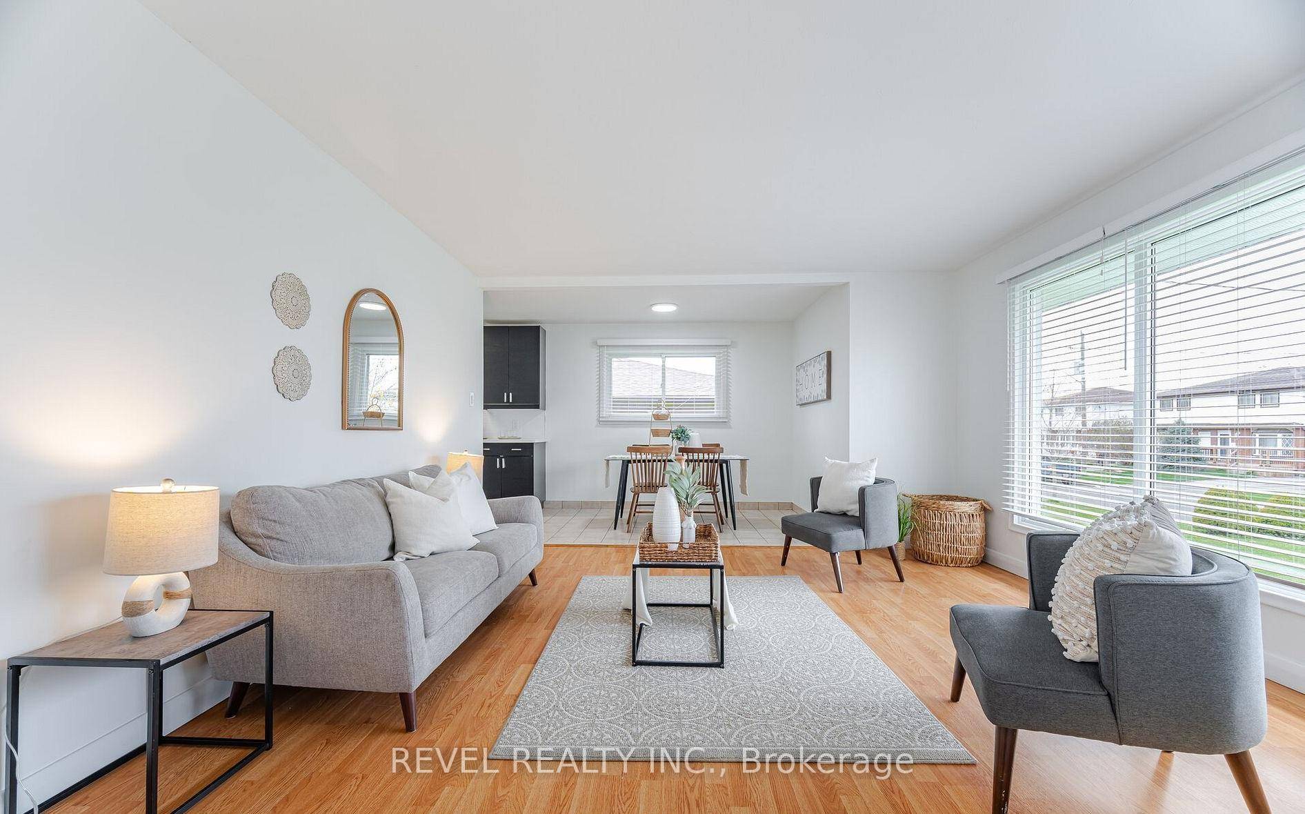 MAIN FLOOR UNIT Ensuite Laundry, 3 Large Bedrooms With Windows, 1 Full Washroom, 3 Driveway Parking Spots.