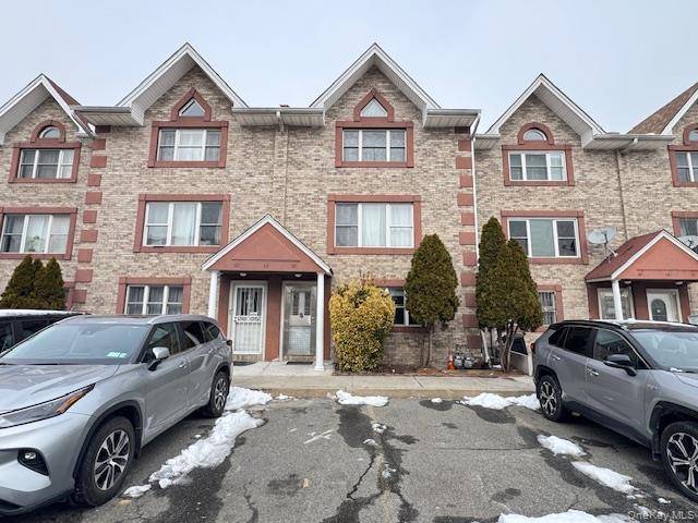 Beautiful two family townhouse is a great find, offering move in ready convenience !