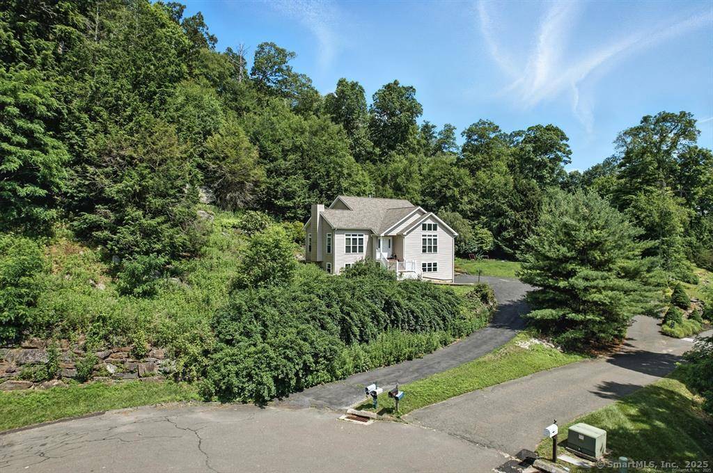 Experience modern living in this contemporary gem nestled at the end of a quiet cul de sac, boasting high ceilings and abundant natural light throughout.