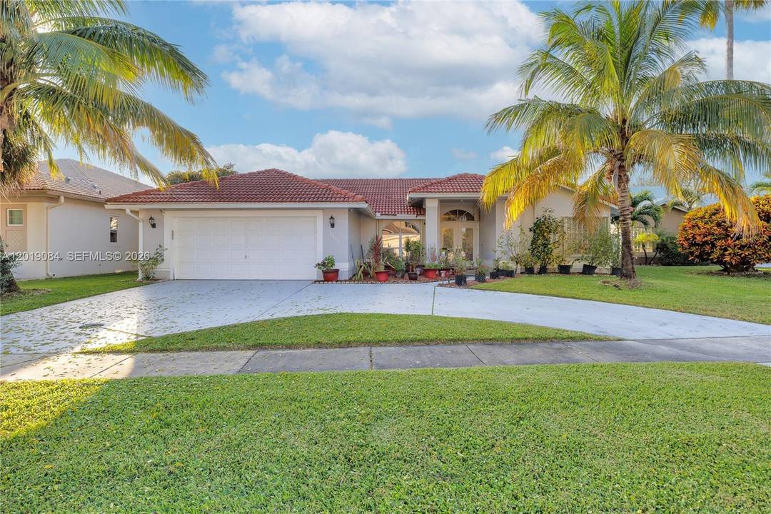 Beautiful 4 Bedroom plus spacious Family Room, Office, an additional room, Florida Room Outdoor Kitchen w pantry, 3 Baths, 2 Car Garage house with amazing FRUIT GARDEN in desirable Farmington ...