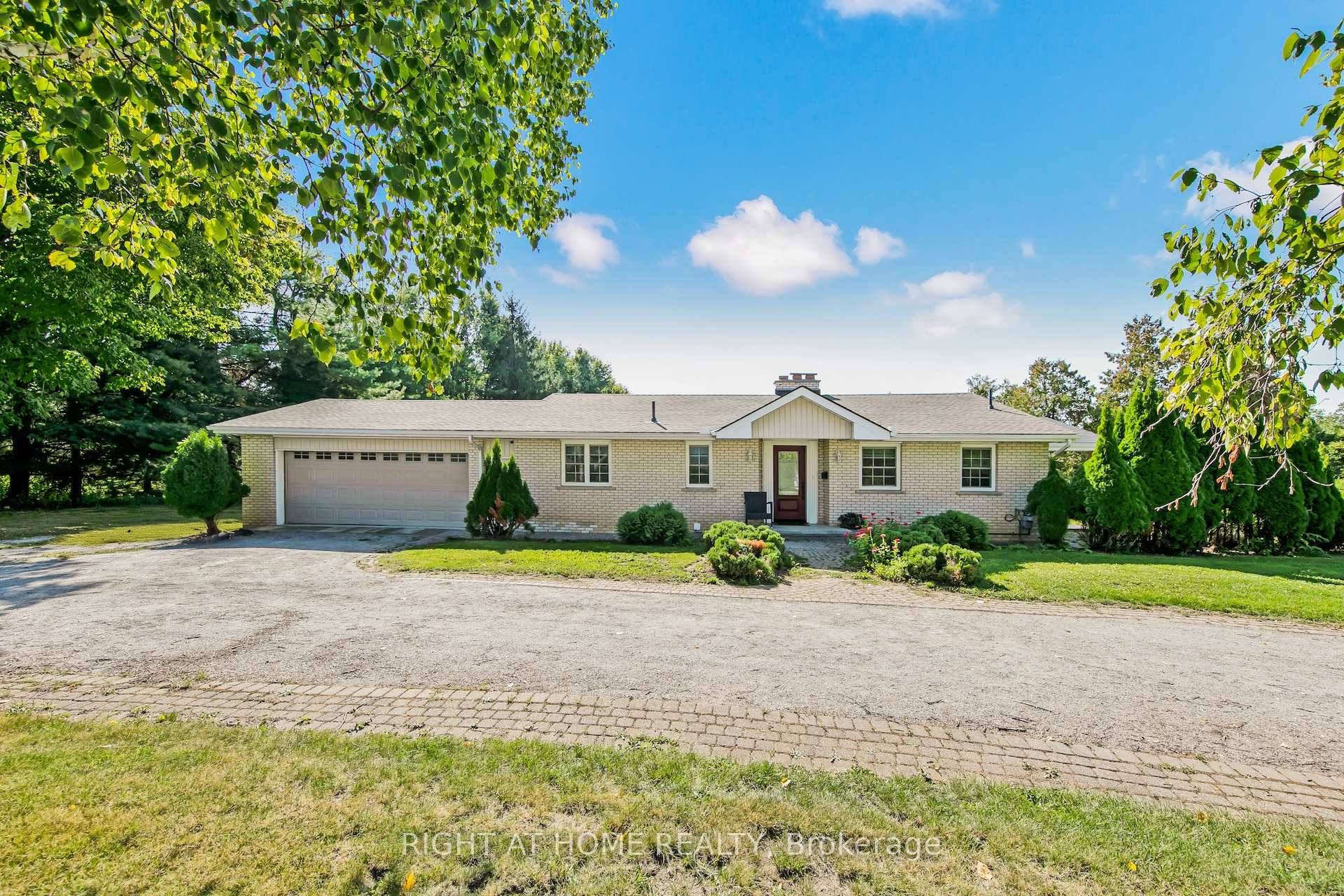 Set on over 1. 2 acres in peaceful Rural Innisfil, this spacious raised bungalow is the perfect place to call home.