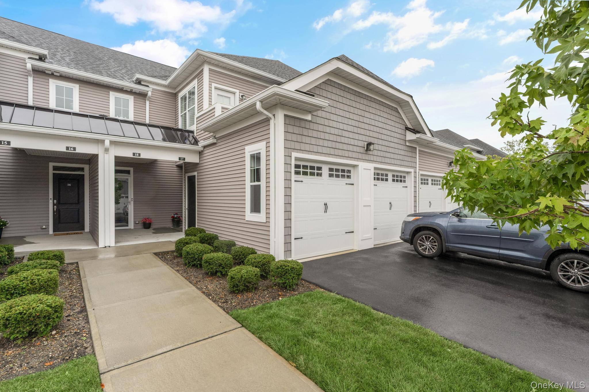 Sophisticated First Floor Living in the young and beautiful Gated 55 Community of The Seasons at Dix Hills.