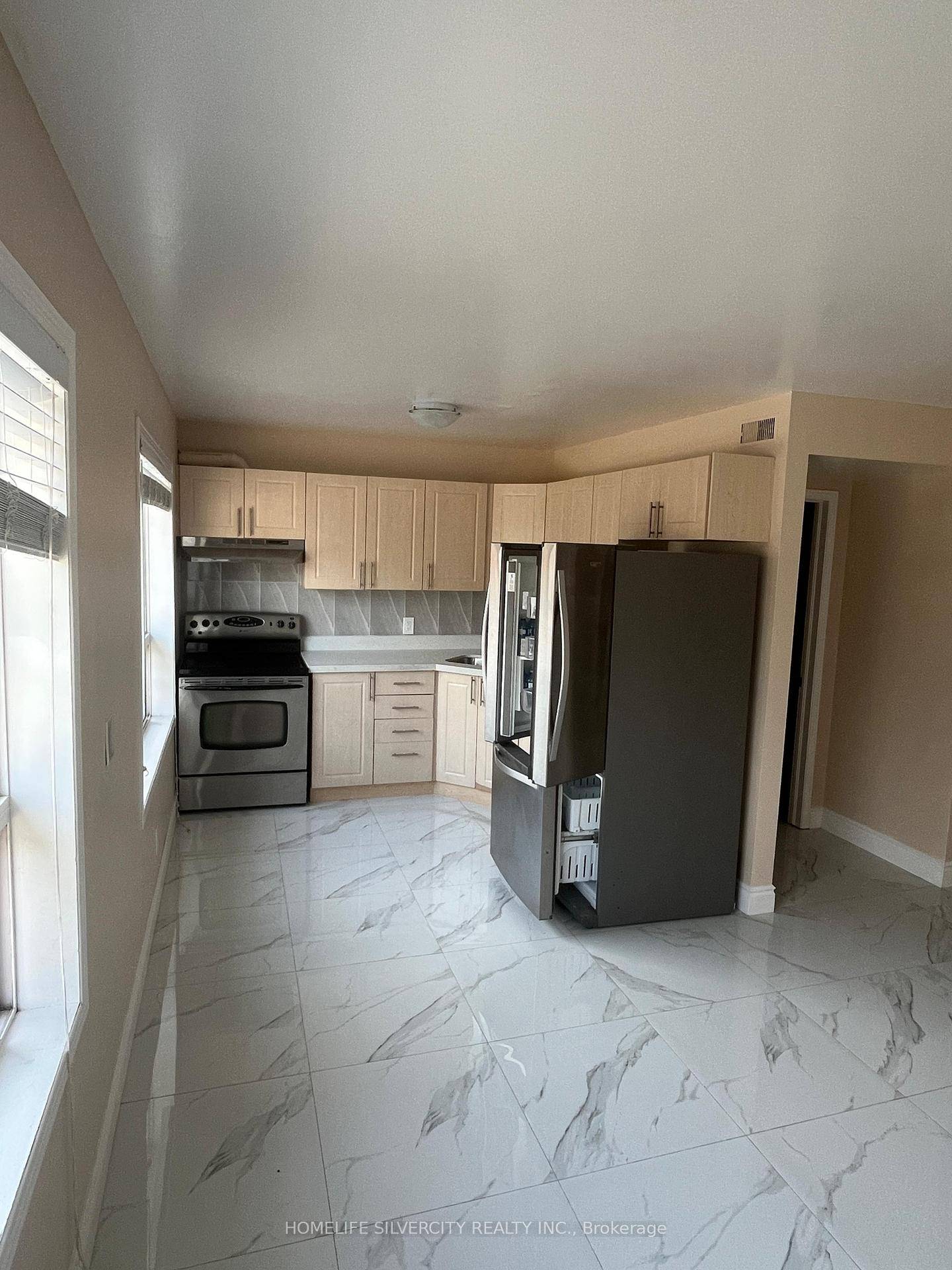 Recently renovated 4 bedroom upper level unit with a 3 piece washroom and 2 parking spaces.