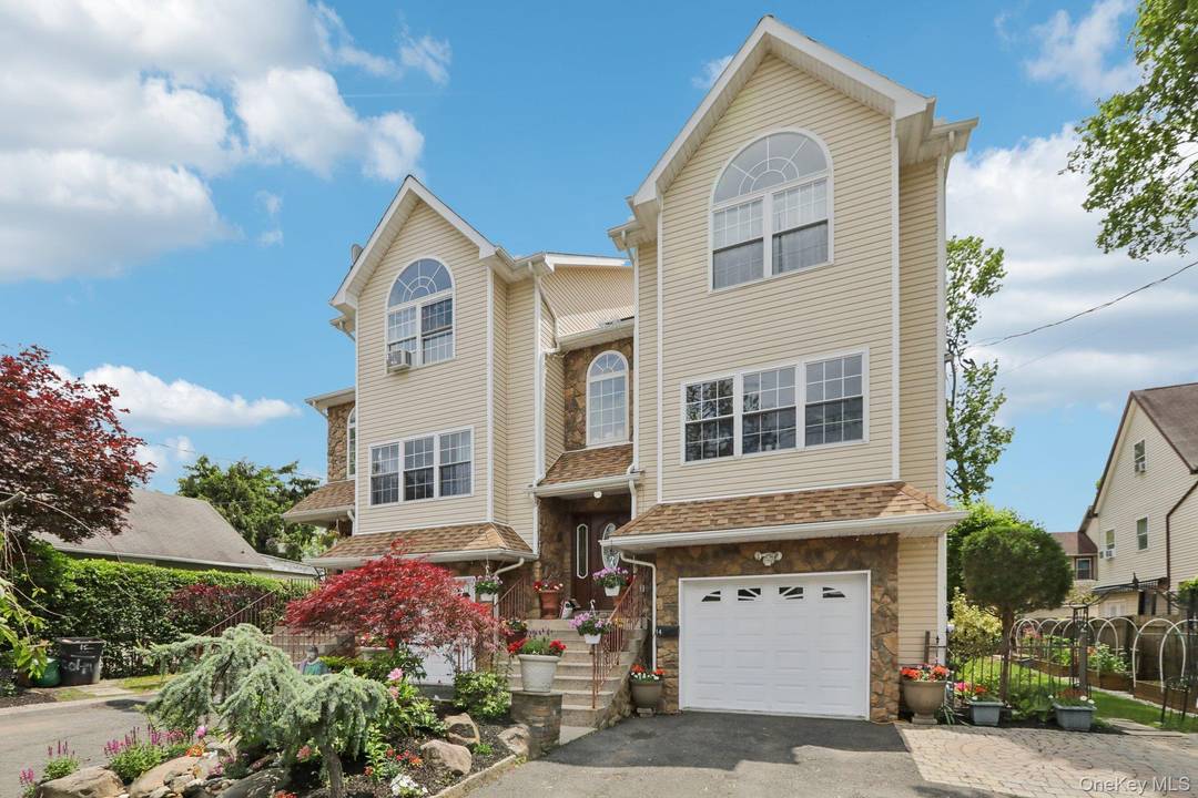 Spacious Side by Side Two Family townhome !