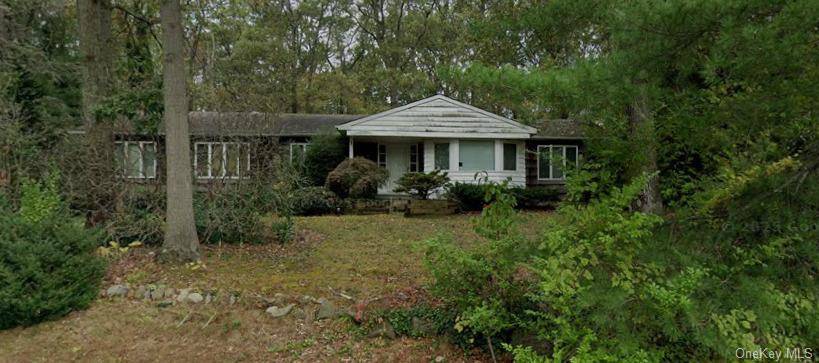 Welcome to 27 Threepence Drive in Melville, NY.