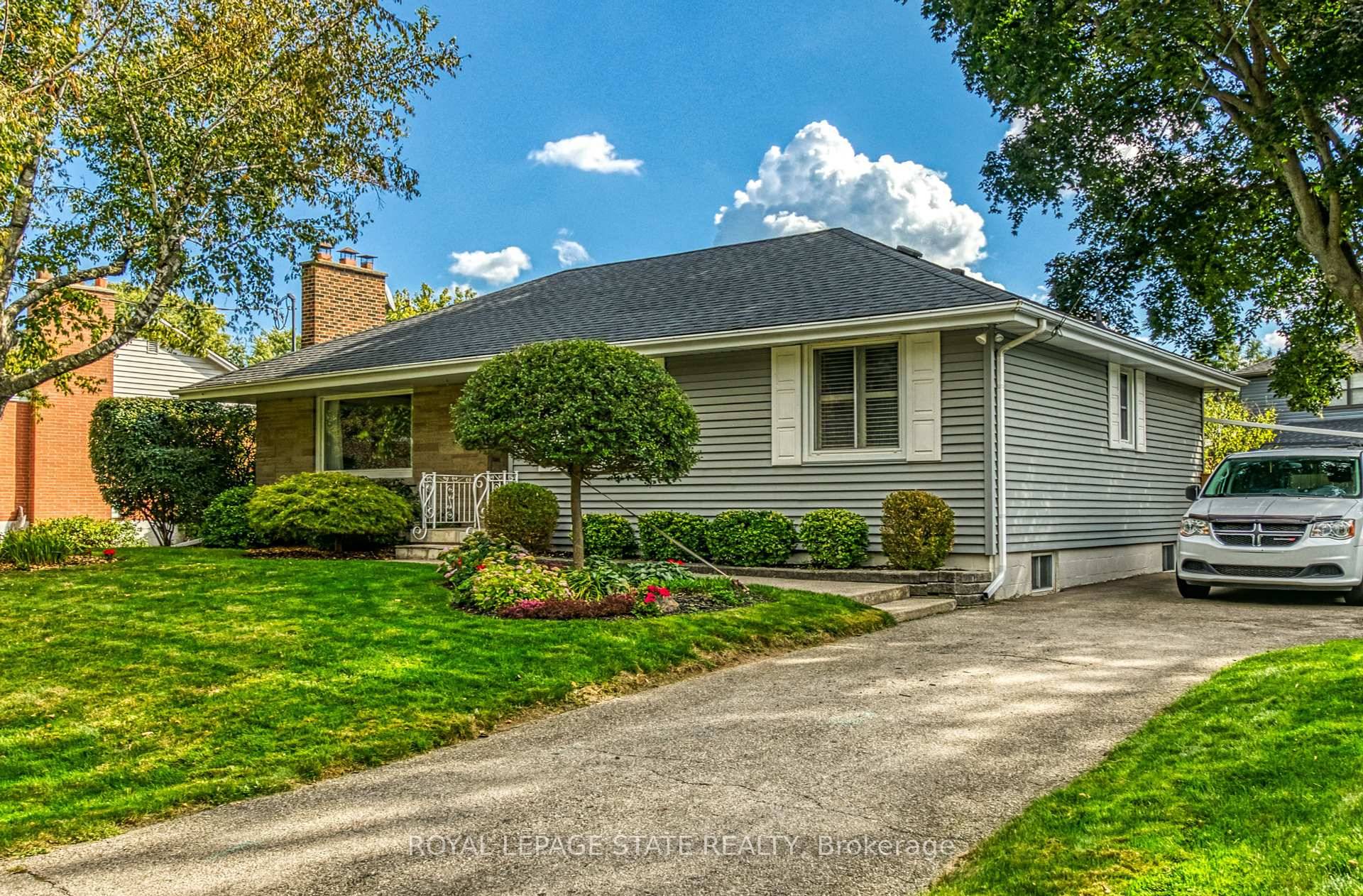 This lovingly maintained bungalow in South Aldershot, Burlington, offers a fantastic layout with some hardwood floors and an inviting bonus family room addition featuring a cozy gas fireplace and beautiful ...