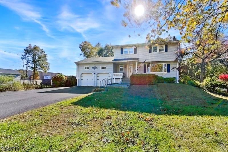 Welcome to this beautifully maintained 4 beds, 2 bath contemporary home featuring a new roof, new front steps, and custom rails.