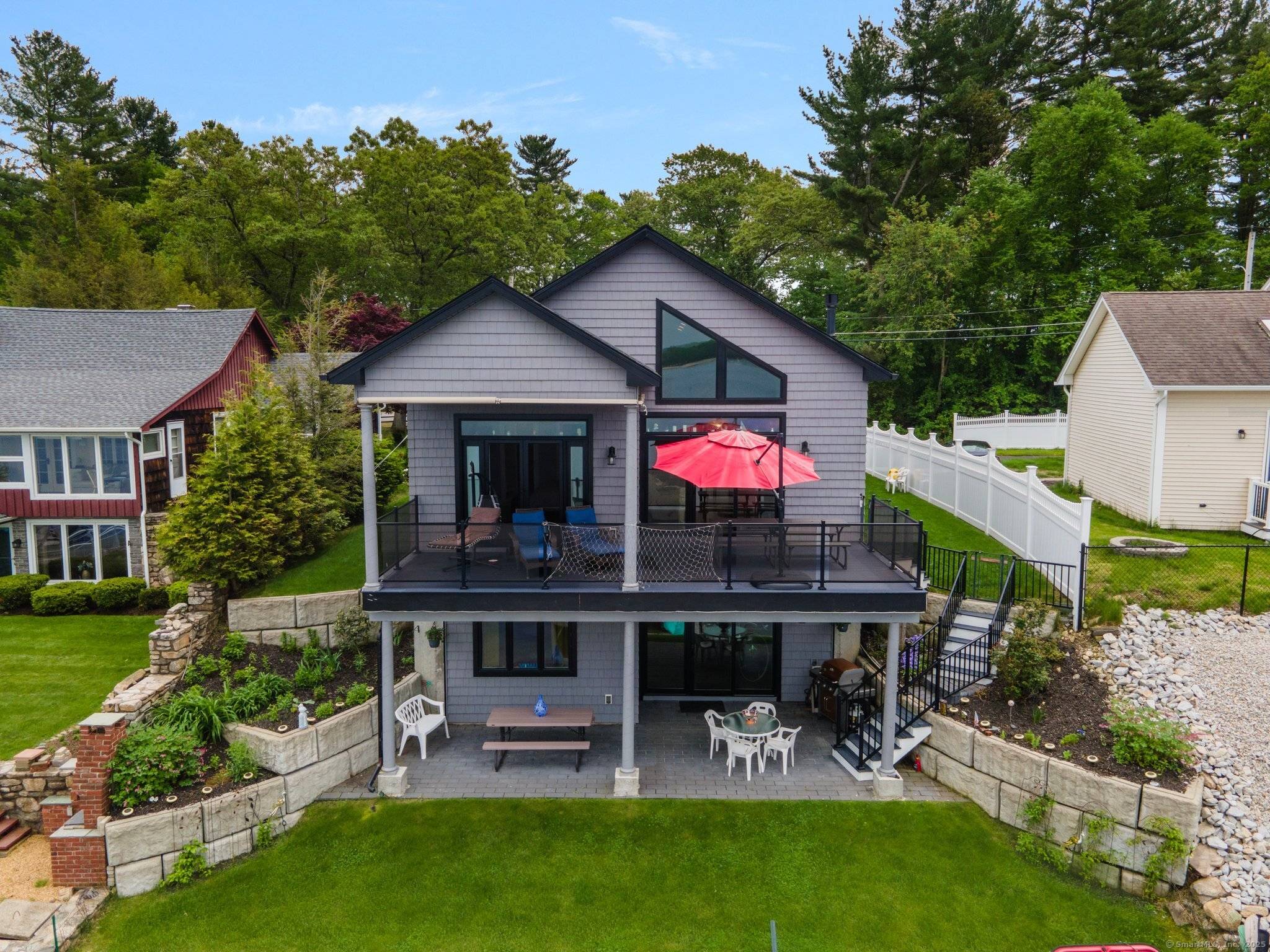 Beautiful morning Views, breathtaking evening sunsets, and all day gorgeous scenery is what you will experience as you look out at Webster lake from this amazing 5 year young ranch ...