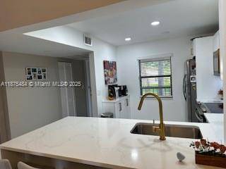 Beautiful 2 2 condo, fully renovated with porcelain tile on the living areas, laminate floor on Bedrooms, Open Concept Kitchen with Quartz Counter top, customized guest closed with lots of ...