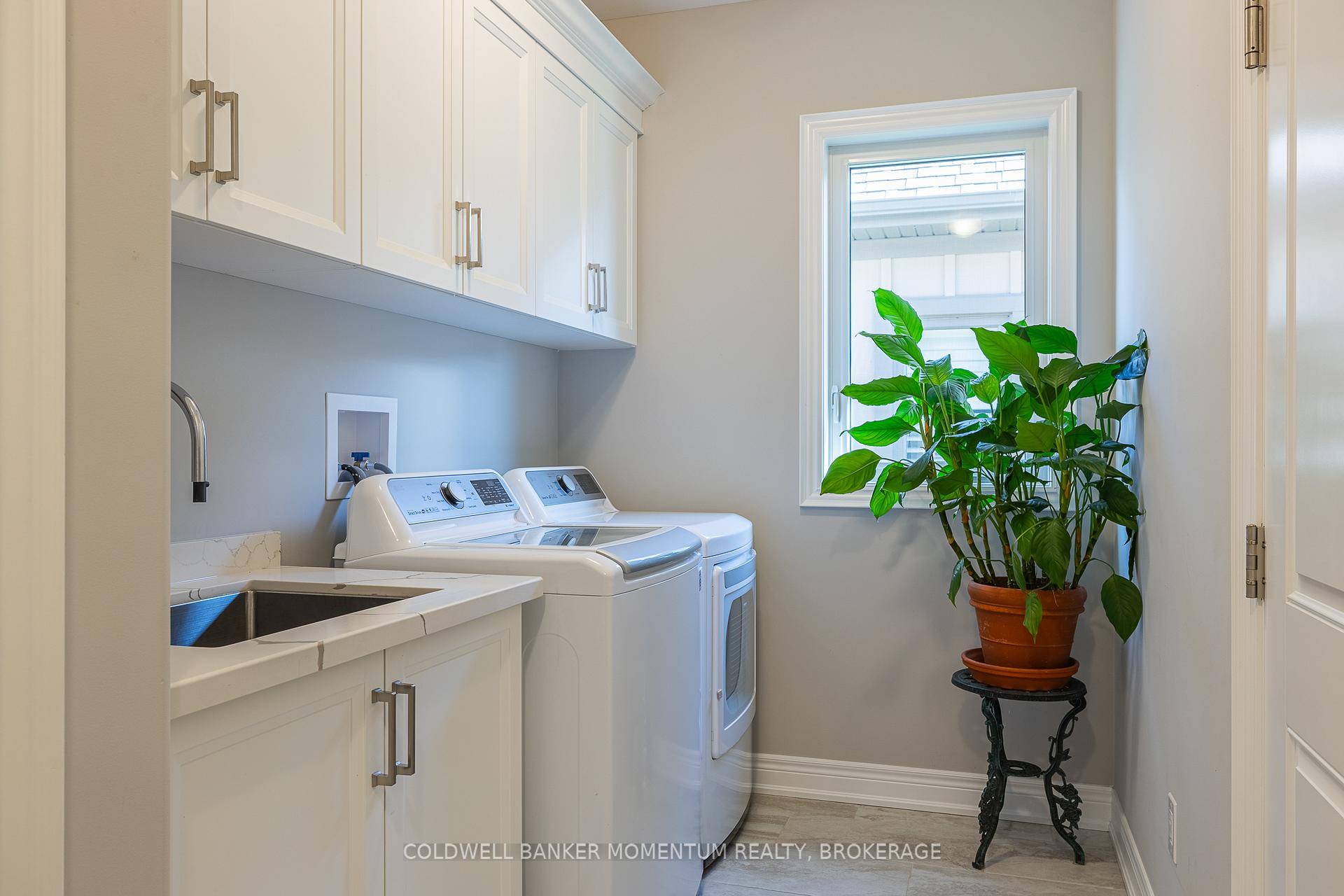 Stunning 4 yr old end unit bungalow townhouse nestled in the exclusive Spring Creek Manor development of Smithville where it perfectly blends modern luxury with small town charm.