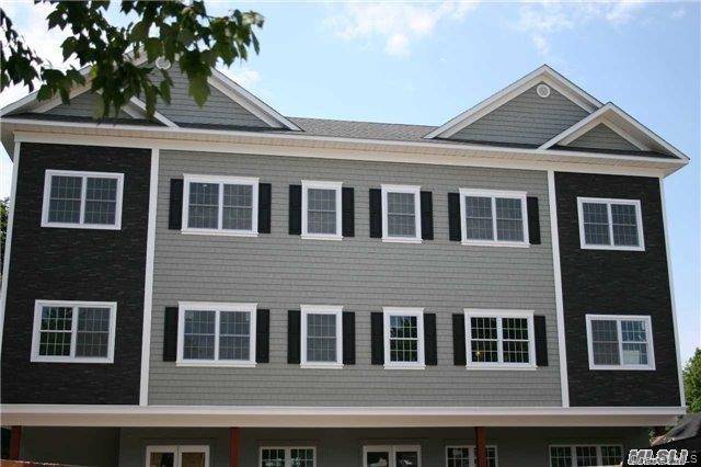 Elevator Building in the heart of Huntington Village with Private Parking Lot.
