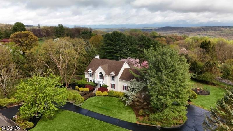 Gorgeous property including perennials, mature pine trees, flowering trees, gazebo, small goldfish pond, decks and patios surround this fantastic Squire Hill custom colonial home, lovingly cared for by its owner ...