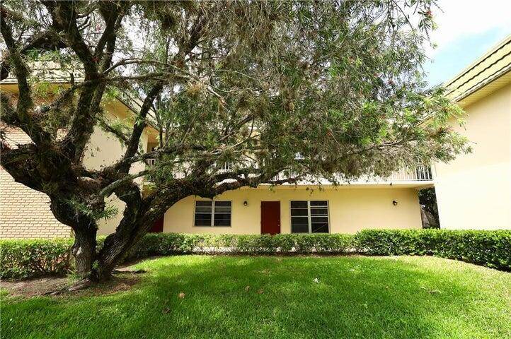 THIS IS IT ! This new to market 1st FL, CORNER condo, quietly nestled in Vista Gardens has it all.