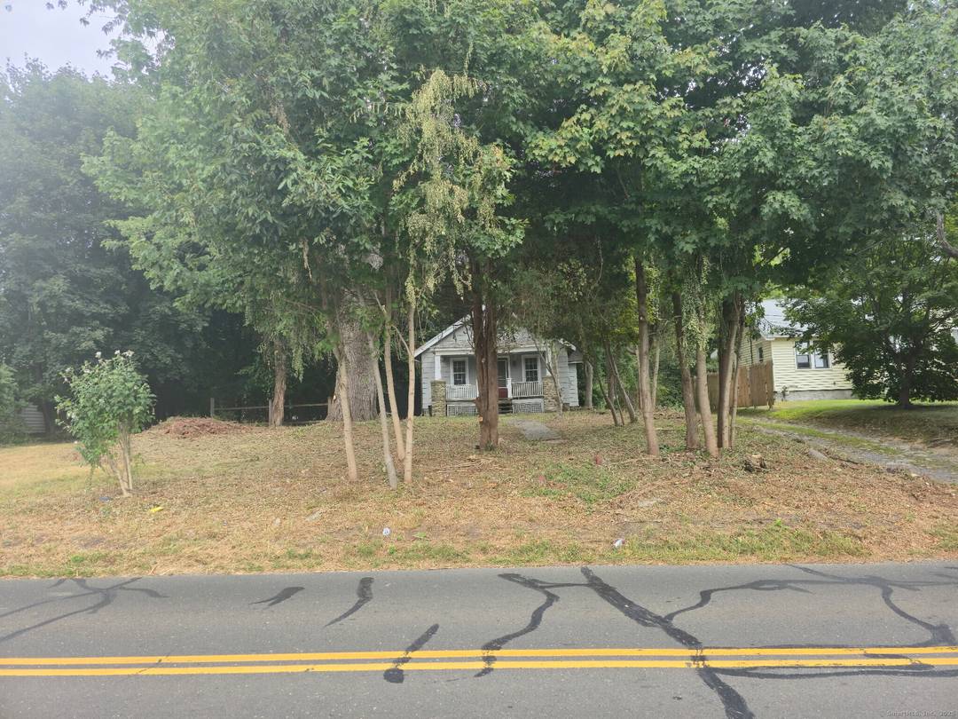 Double Lot Unbelievable opportunity to build your dream home or subdivide into two parcels possibilities are endless at 142 Wolfpit Avenue.