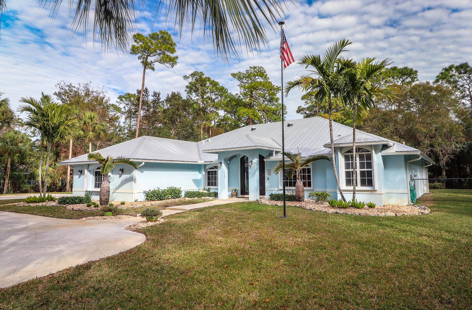 This beautiful ranch style home features three bedrooms, a bonus room or office, and two bathrooms, offering a total of 2, 475 square feet of living space under air.
