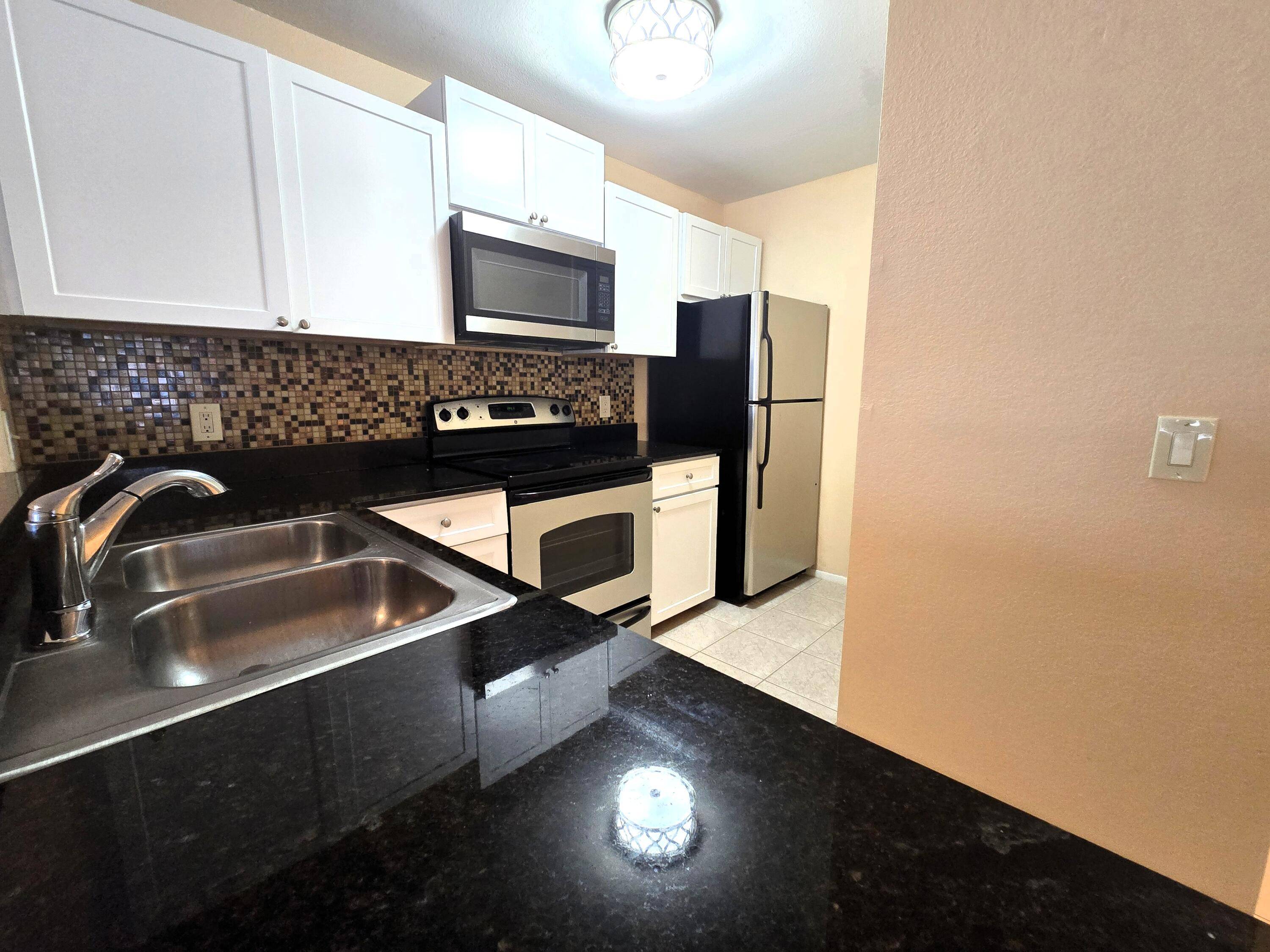 Heart of Delray Beach 2 Bed 2 Bath 1st Floor Property in Gated Community !