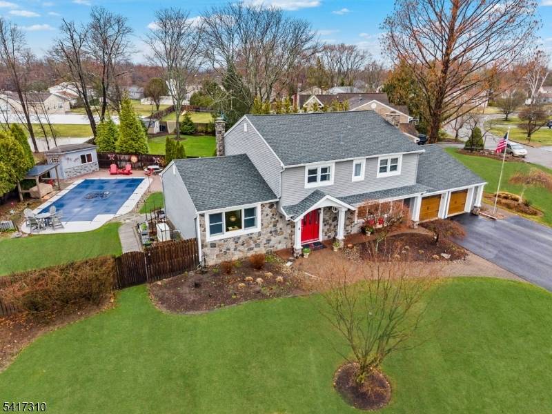 Beautifully maintained inside out, this 4 bedroom, 2.