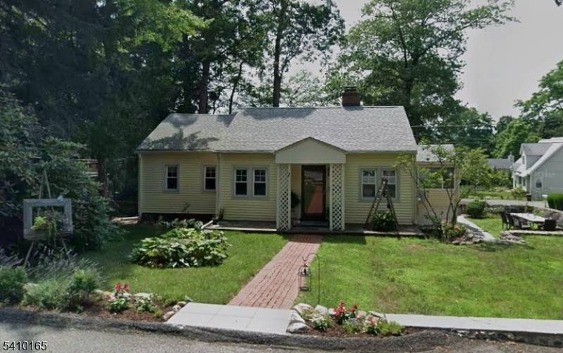Welcome to this charming cottage located on a beautiful corner lot with all the amenities you can imagine.