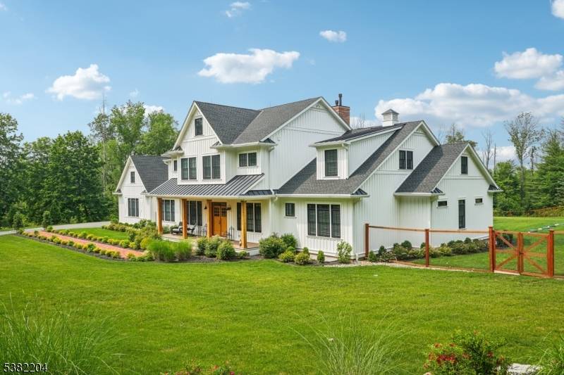 Enjoy a magnificent 2 year old home with 10ft first floor ceilings on 6 acres at the end of a private road.