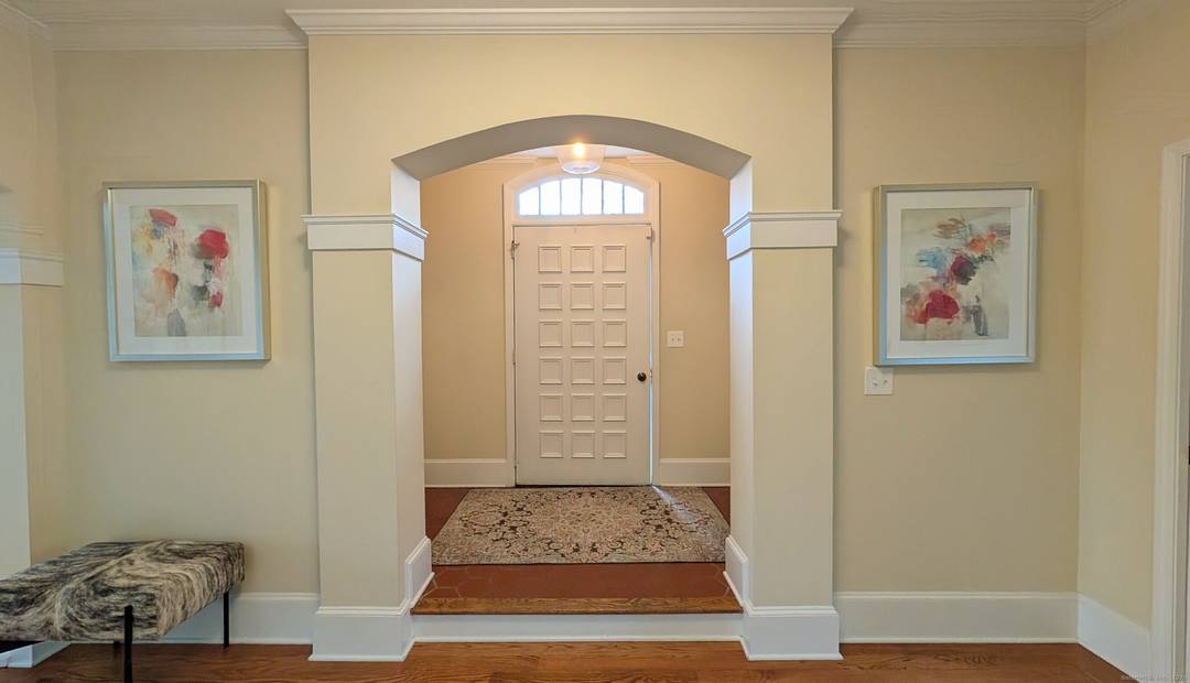 Timeless French Colonial Luxury in a Premier Ridgefield Enclave !