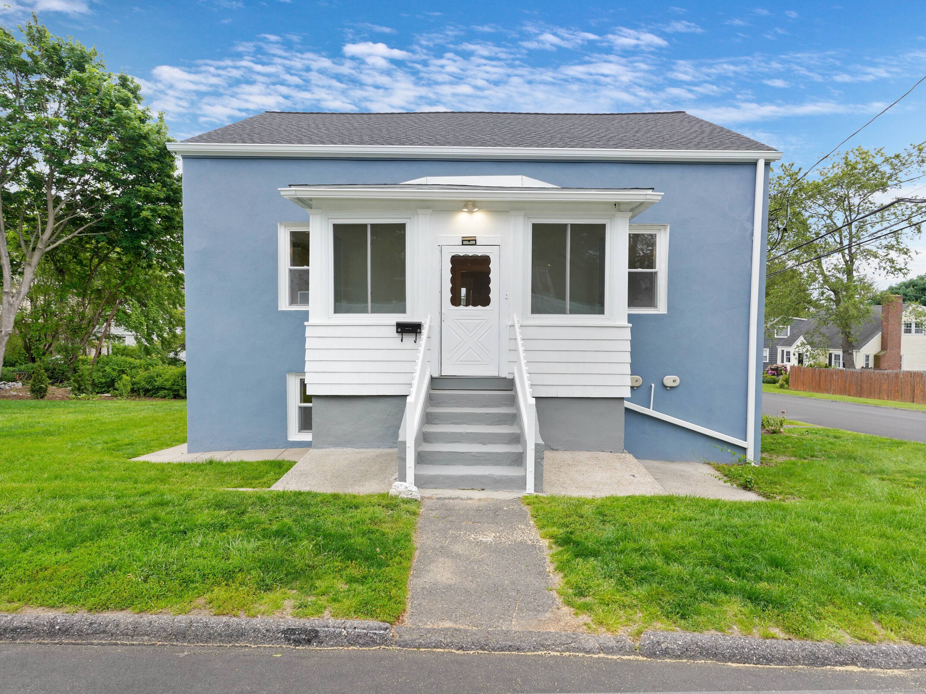 Beautifully renovated 2 family located on quiet side street 2 separate off street driveways.