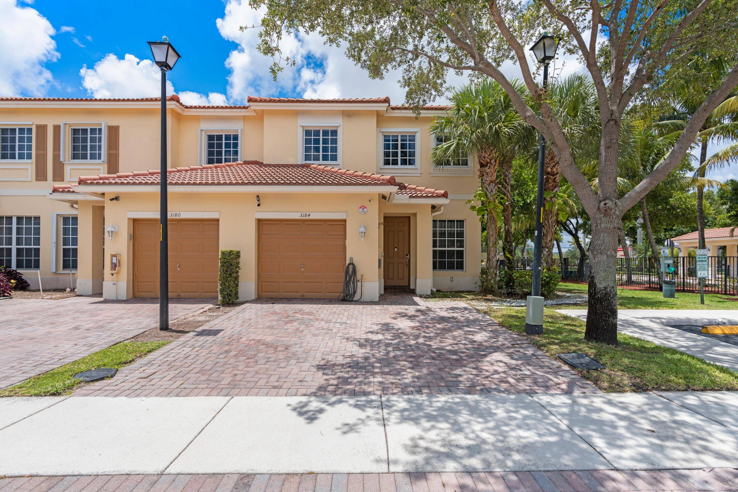 Beautiful and spacious corner home in the quiet gated community of Isles at Oakland Park.