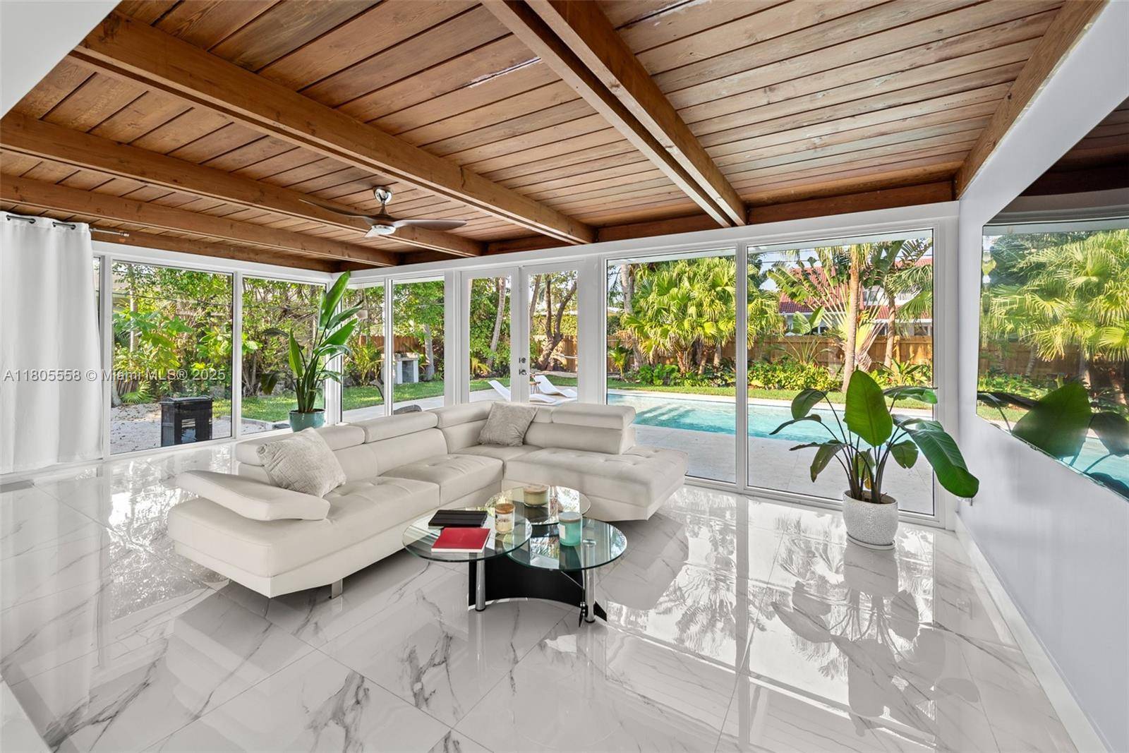 Charming home in Hollywood Lakes on Washington Street, nestled on a rare double lot with a lush, beautifully landscaped garden.