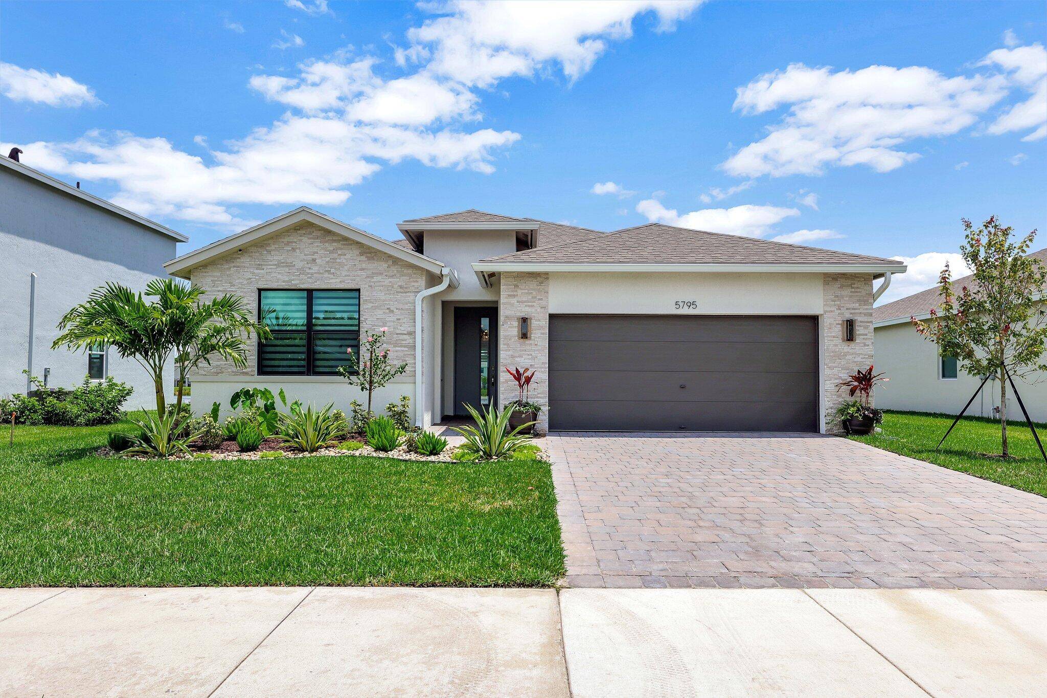 Move right in to this annual or seasonal brand new designer furnished home.