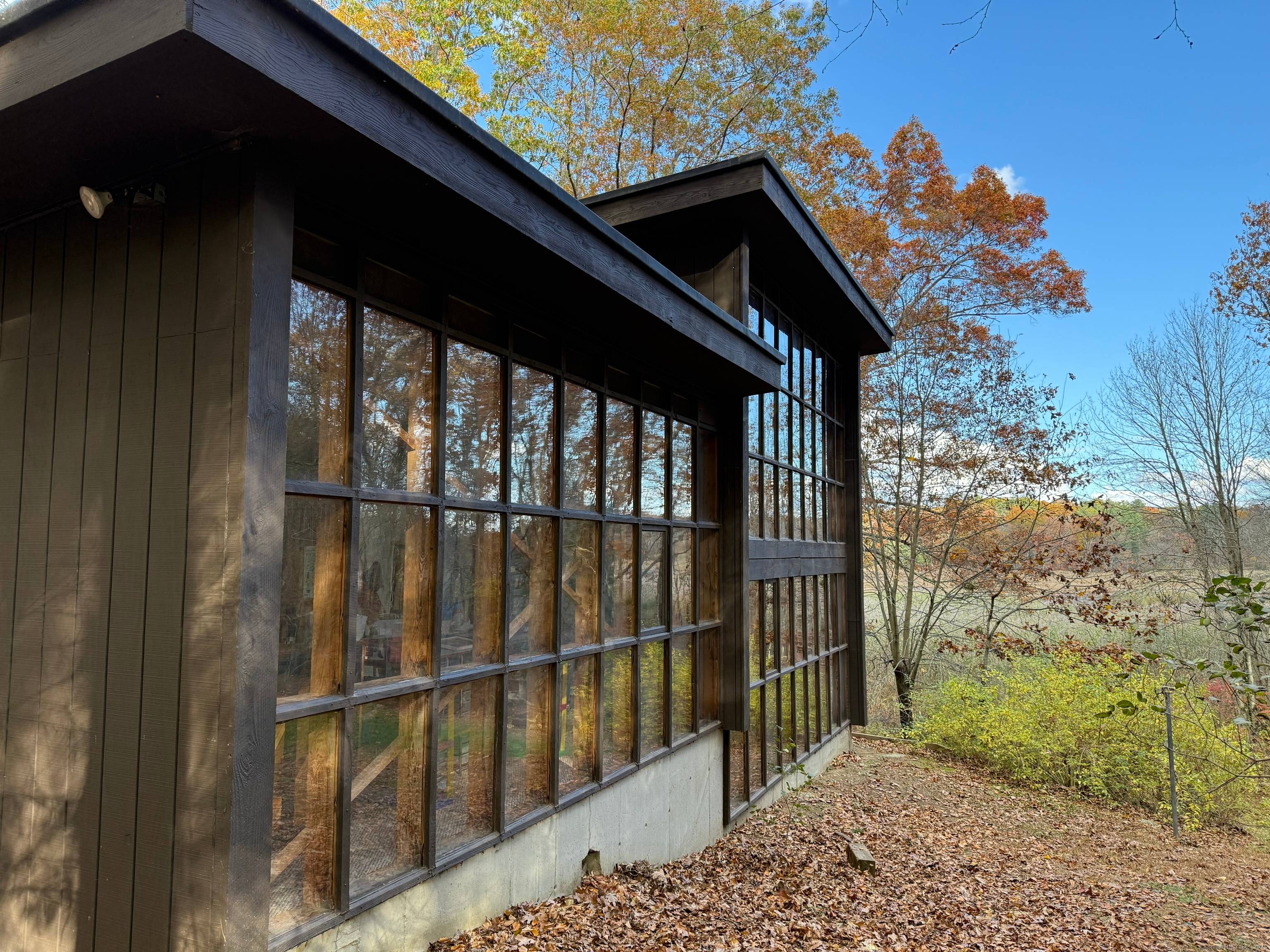 House overlooks 100 acres of town designated open space.