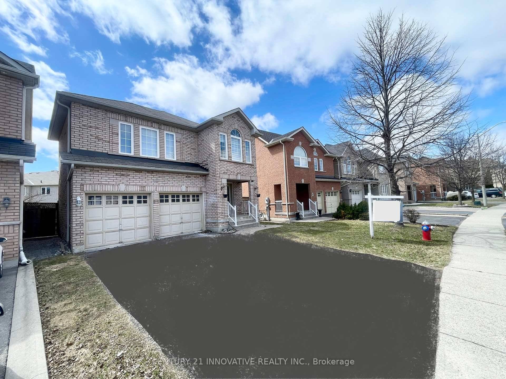 Stunning Detached Home with Double Garage in a Highly Sought After Neighborhood !