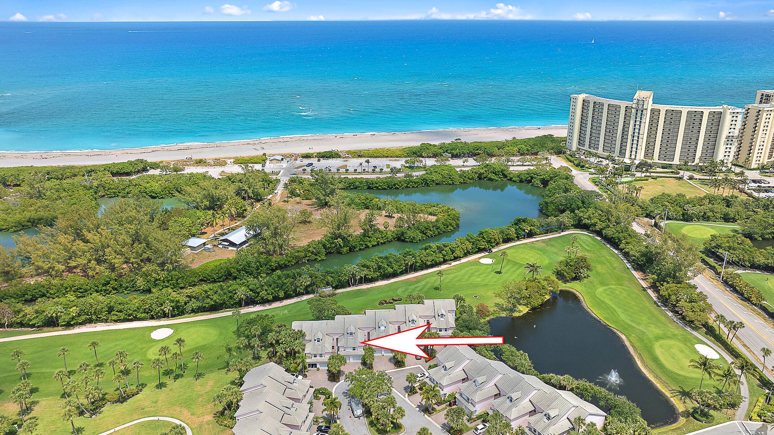 BEACH, GOLF, PARADISE ! This stunning ground floor residence in the gated coastal enclave of The Estuary at Jupiter Dunes, directly on the golf course, offers a lifestyle most only ...