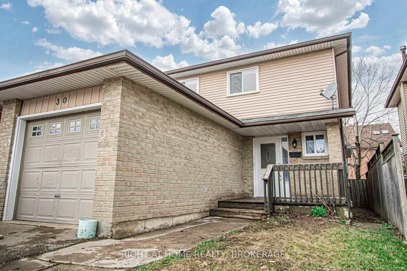 Stunning Find ! Bright and airy open concept design, freshly painted throughout !