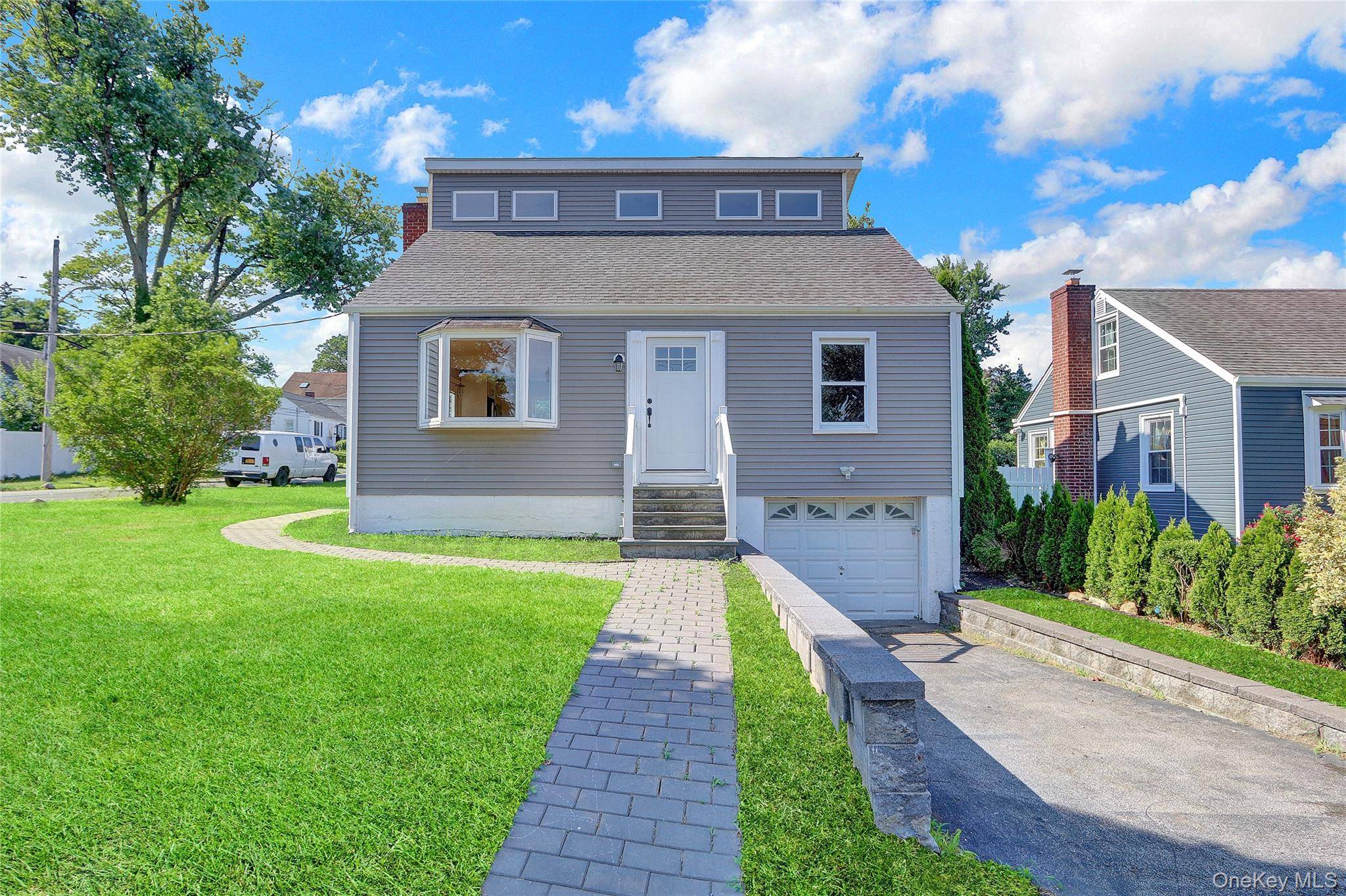 Cape Style Home. This Home Features 4 Bedrooms, 2 Full Baths, Eat In Kitchen amp ; 1 Car Garage.