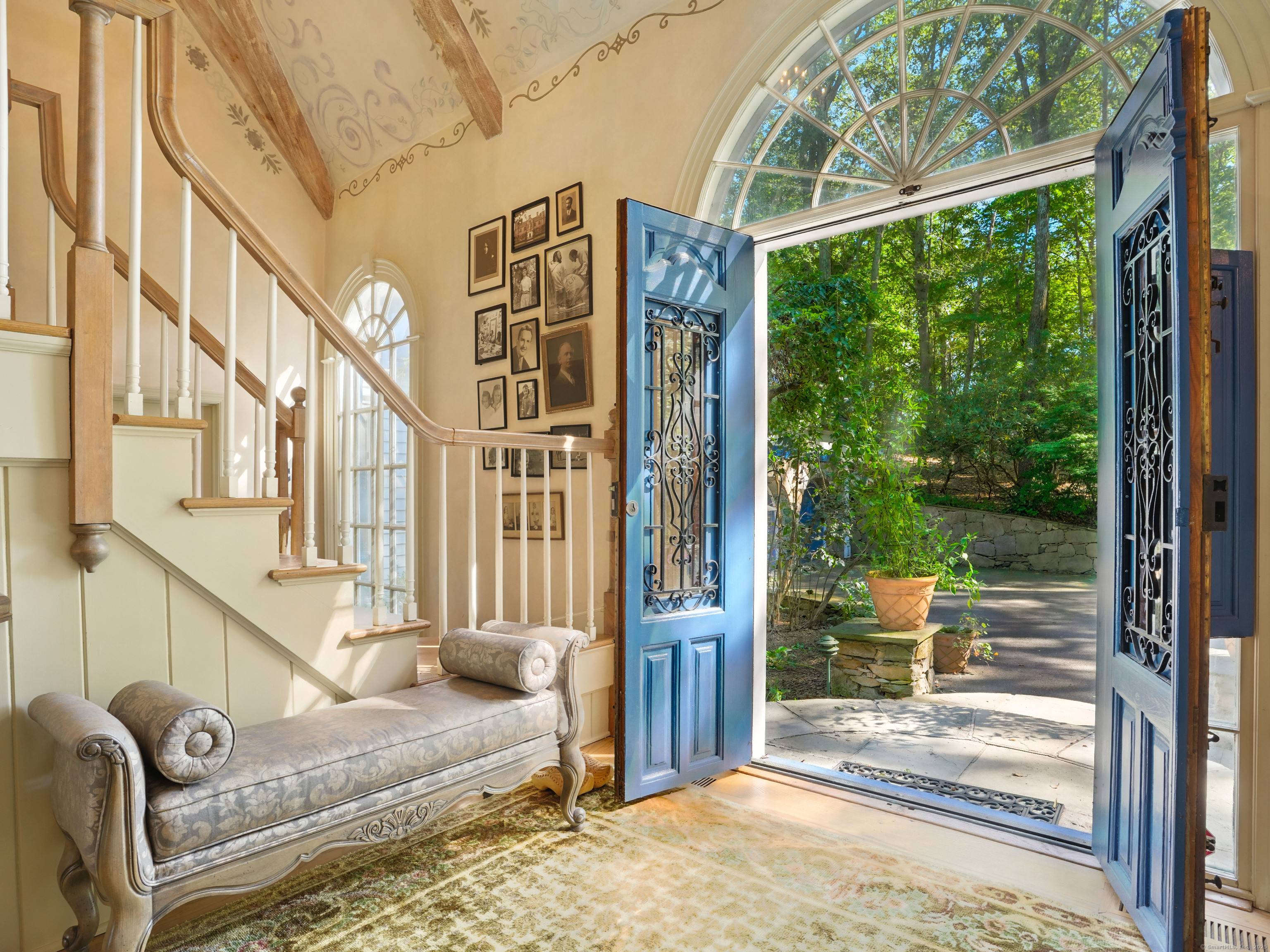 Nestled in the rolling hills of North Stamford, this celebrity French Country Colonial is a masterpiece of artistry and history.