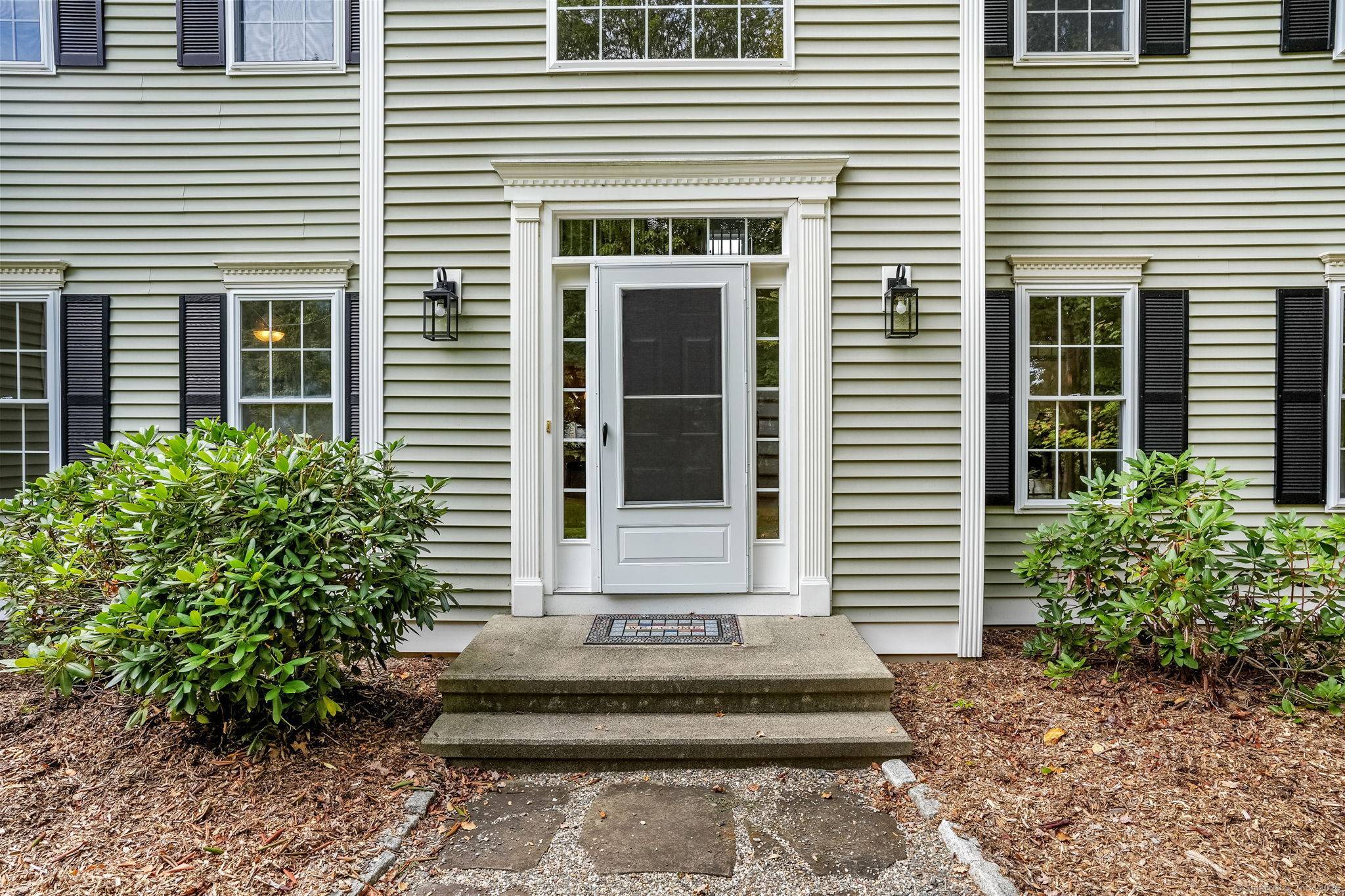 Step into the grand two story foyer of this inviting Colonial, setting a warm, timeless tone.