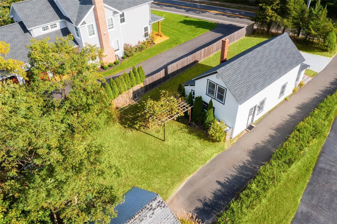 Discover this beautifully renovated historical bungalow, conveniently located near the heart of East Quogue.